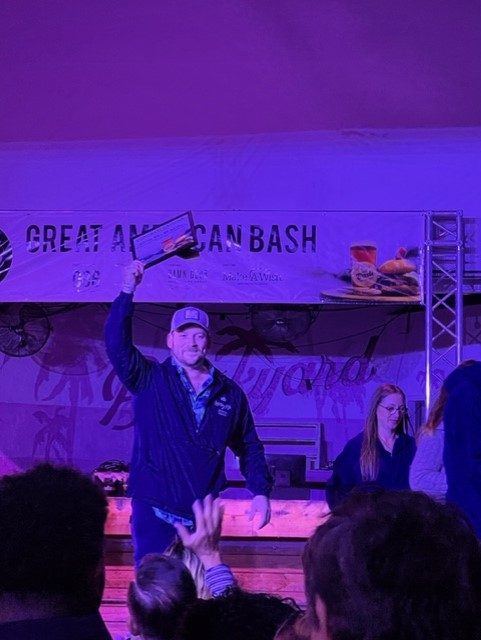 Lucky Fish Pompano Team at the Great American Bash, snagging the win on stage.