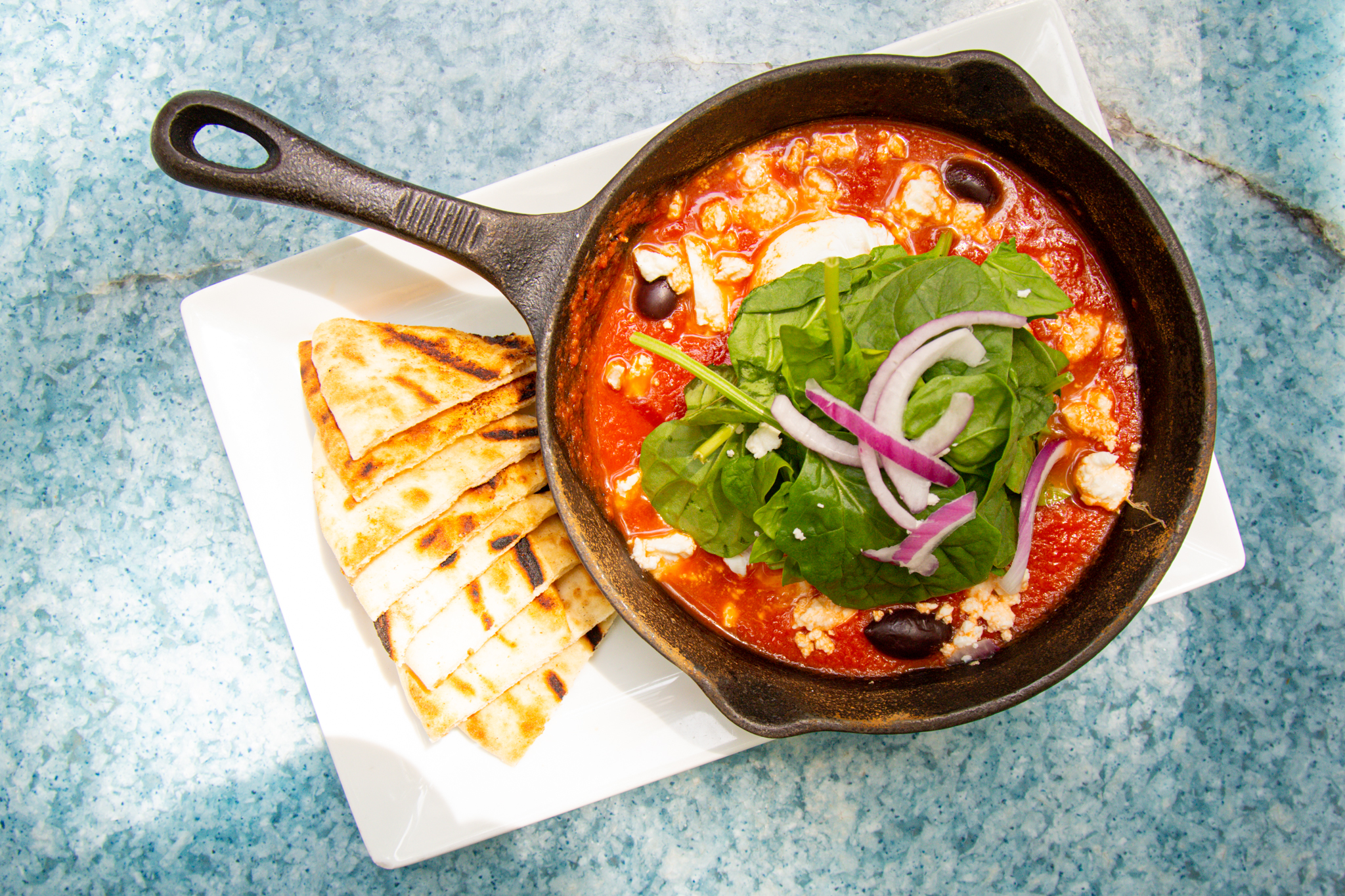 Taverna Agora Shakshuka Featured as Best in Raleigh Magazine