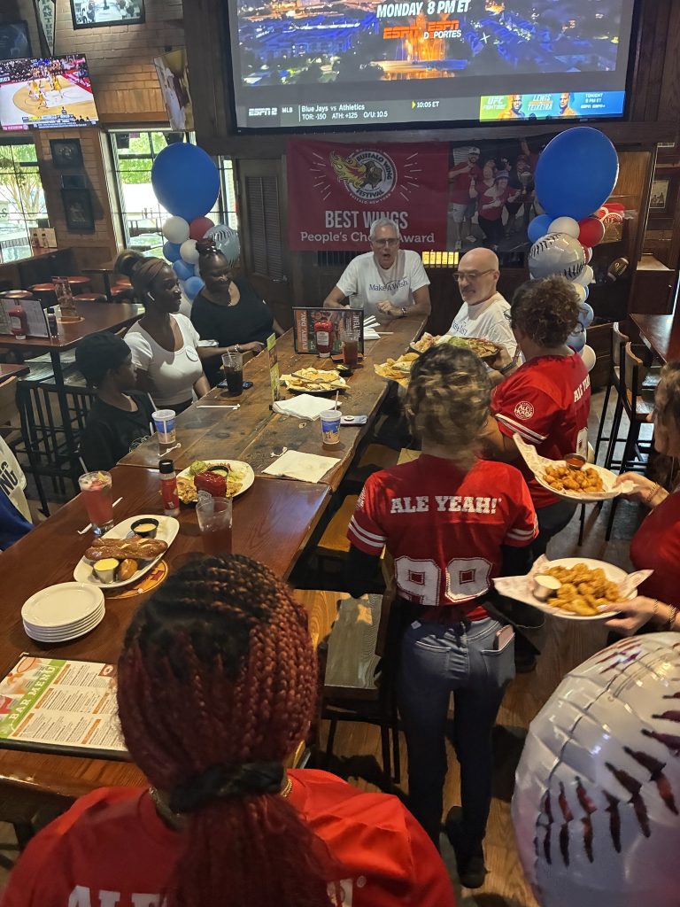 Carolina Ale House Concord Mills, NC, team granting a wish through the Make-A-Wish Foundation in July 2025.