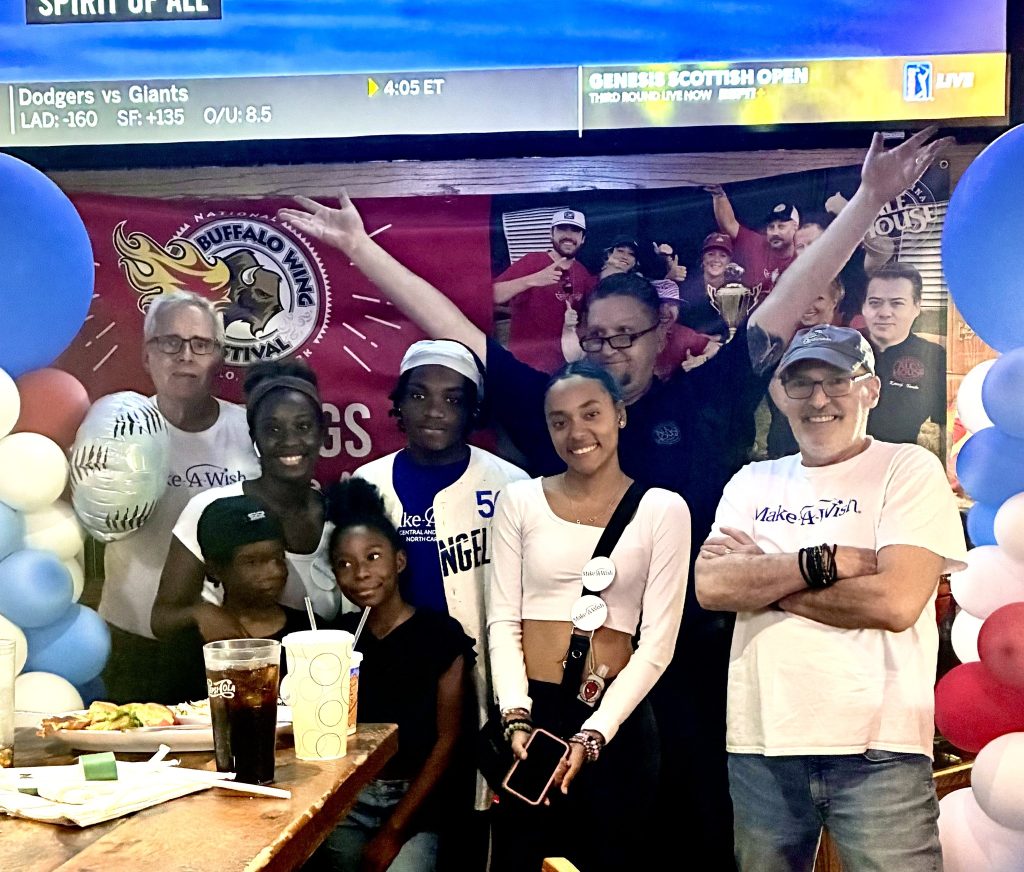 Carolina Ale House Concord Mills, NC, team granting a wish through the Make-A-Wish Foundation in July 2025.