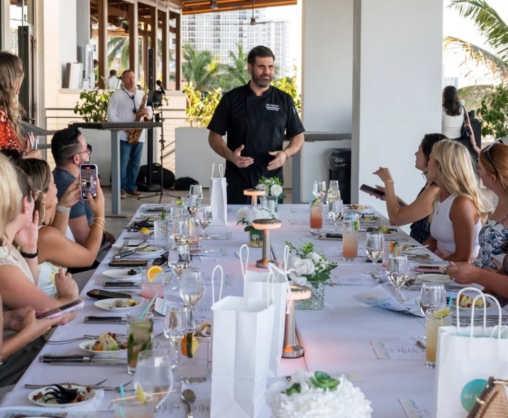 Oceanic Pompano Beach, FL, Chef discussing the dishes with the table