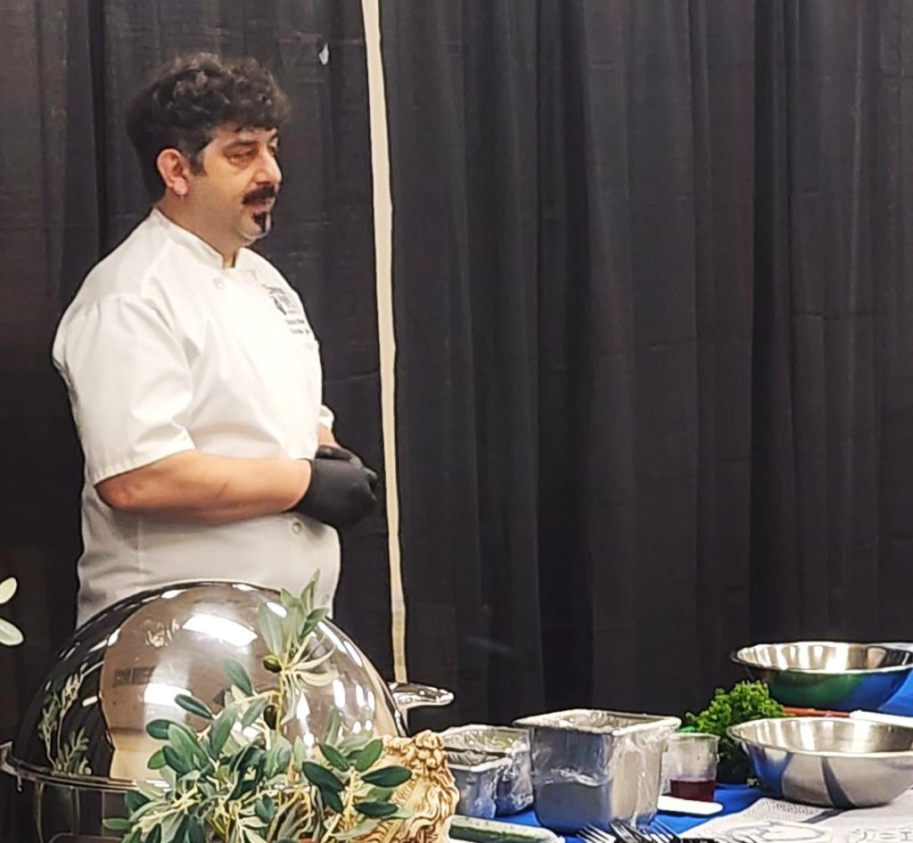 Chef Spyros of Taverna Agora teaching at the 2025 Raleigh Greek Fest