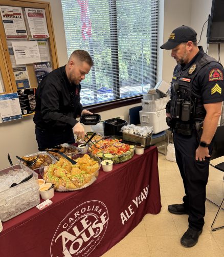 North Raleigh NC PD. NC Carolina Ale House teams visit first responders and medical staff for Labor Day 2025 to bring food to share and love.