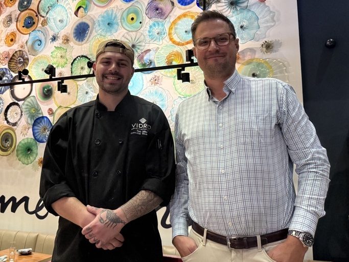 LM Restaurants' Chef Rob and DM Brian celebrating Chef's promotion to Executive Chef of Smash Social Club in Downtown Raleigh, NC