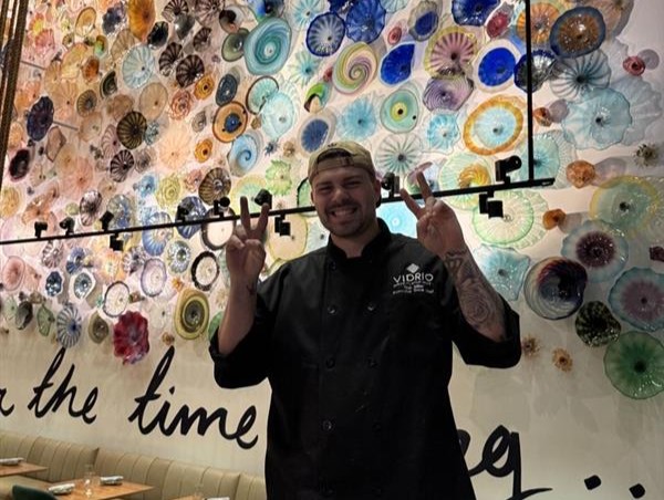 LM Restaurants' Chef Rob celebrating Chef's promotion to Executive Chef of Smash Social Club in Downtown Raleigh, NC