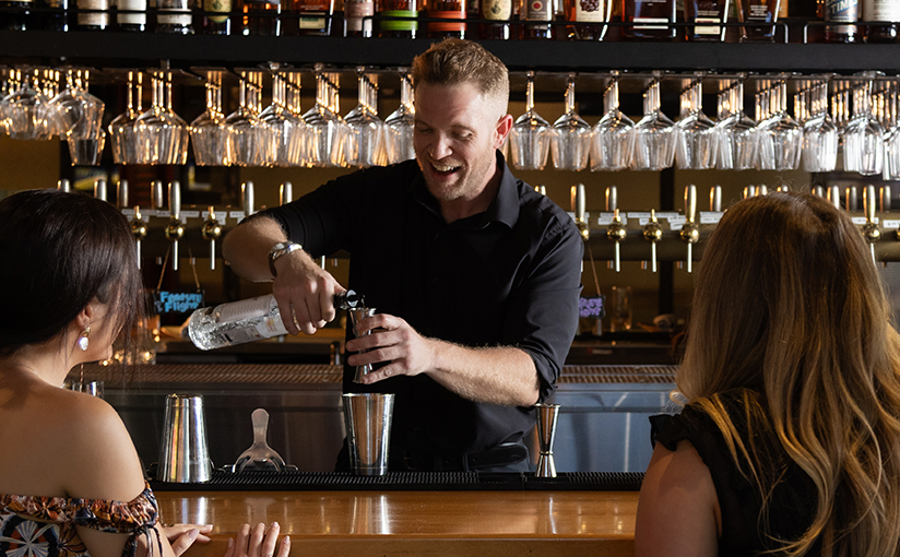 LM Restaurants Vidrio Bartender serving guests