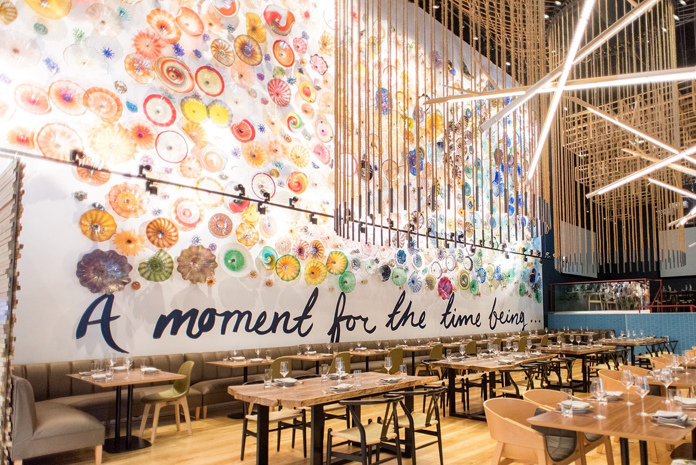 Vidrio Raleigh - Downstairs dining area and blown glass wall by artist Doug Frates