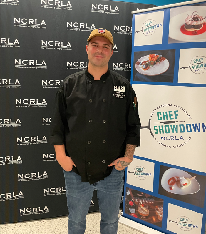 Chef Rob of Birdie's Barroom & Kitchen (Raleigh, NC), posing with his team at the NCRLA Chef Showdown competition in 2026.